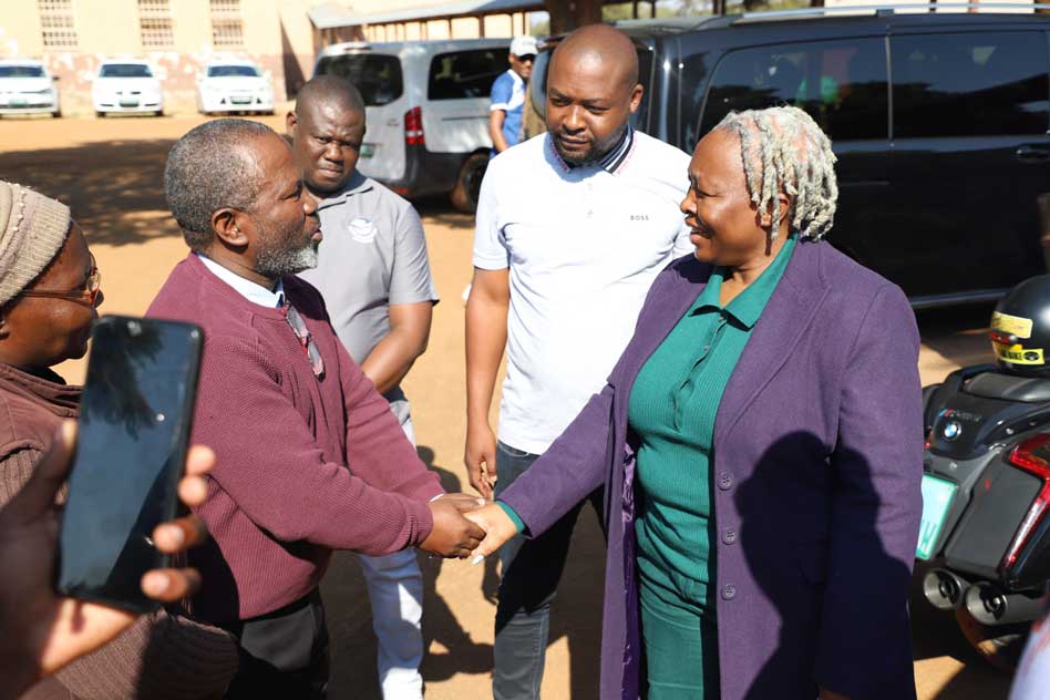 Speaker of the Legislature, Dr. Desbo Mohono together with Grove Foundation donated sanitary towels, school shoes and pre-used furniture at Tshidi Barolong Secondary School in Mahikeng.